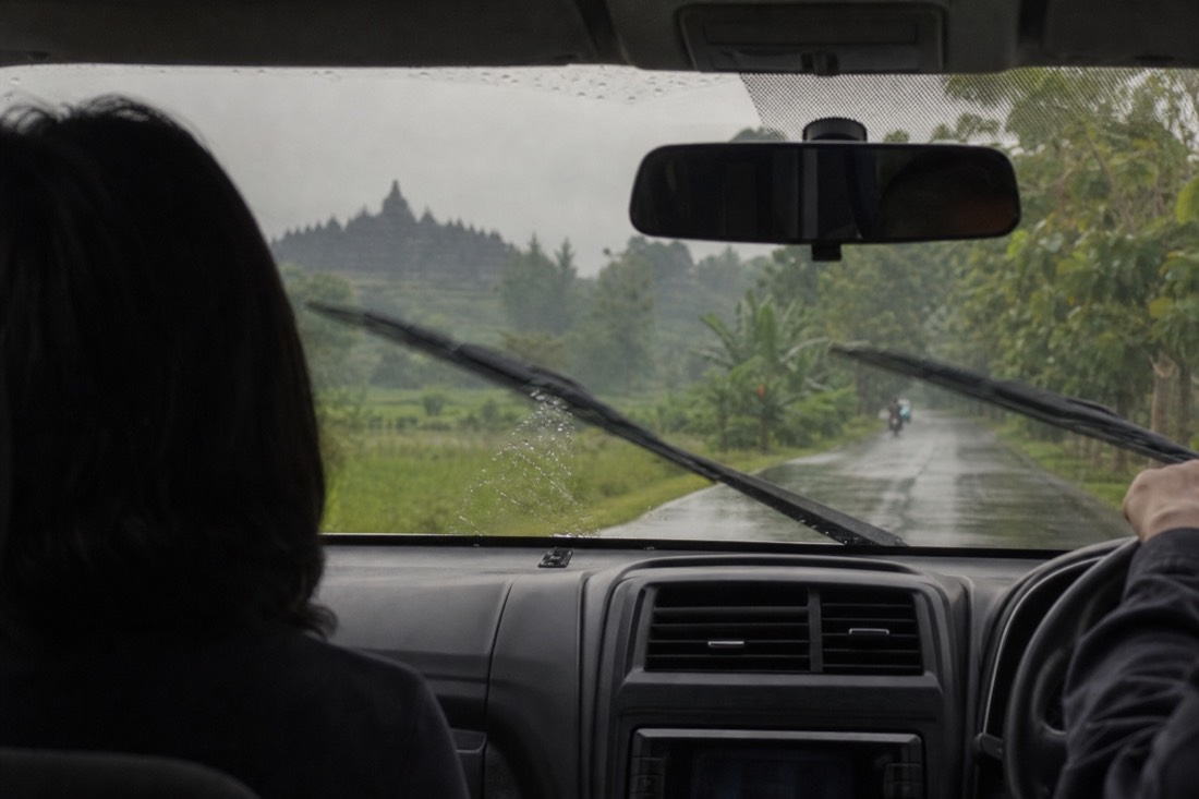 Driving toward Borobudur through tropical rain