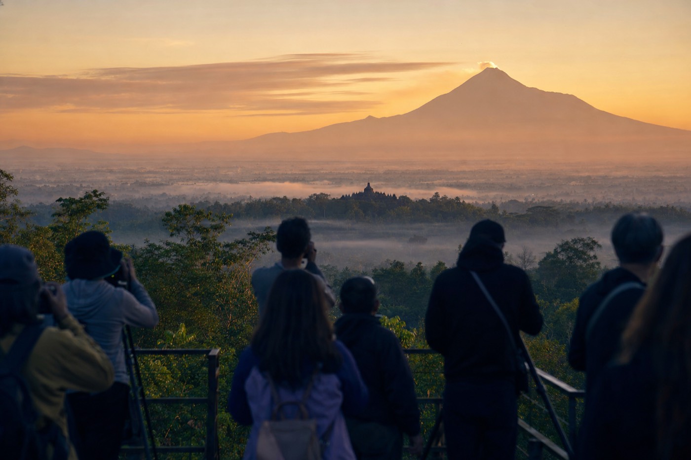 Dawn from Punthuk Setumbu hill: Borobudur temple silhouetted above the mist across the Kedu Plain