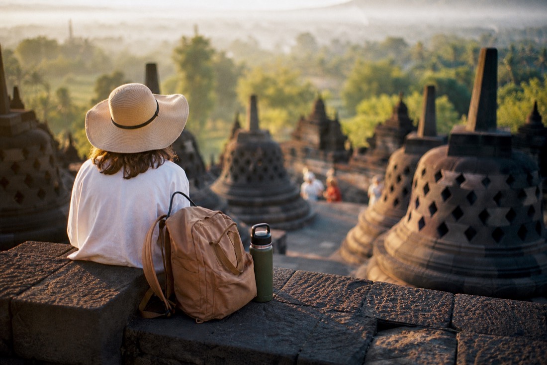 What visitors carry onto Borobudur: hat, daypack, water