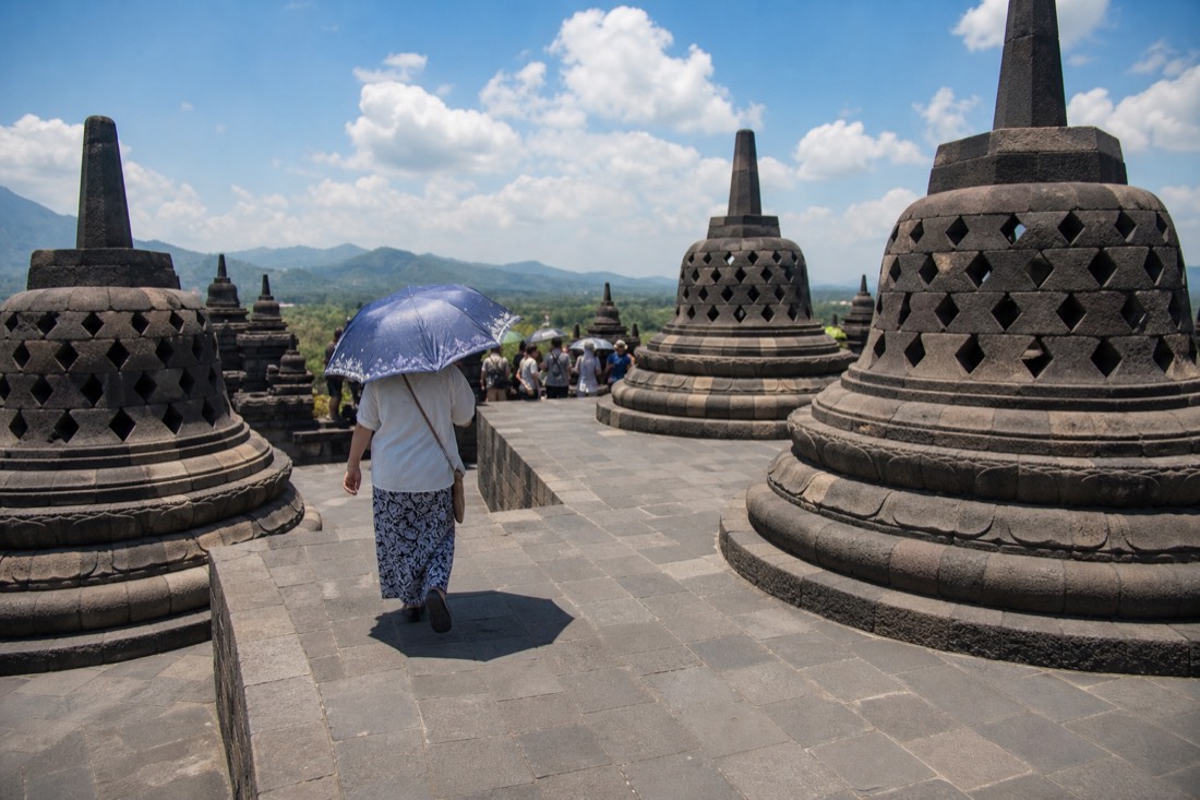 Shading from the sun on the open terrace of Borobudur
