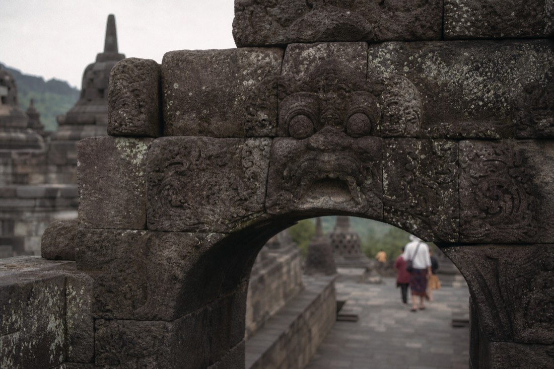 Weathered andesite stonework and carving detail at Borobudur temple