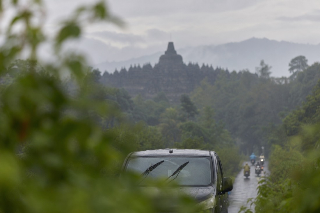 Driving toward Borobudur through tropical rain