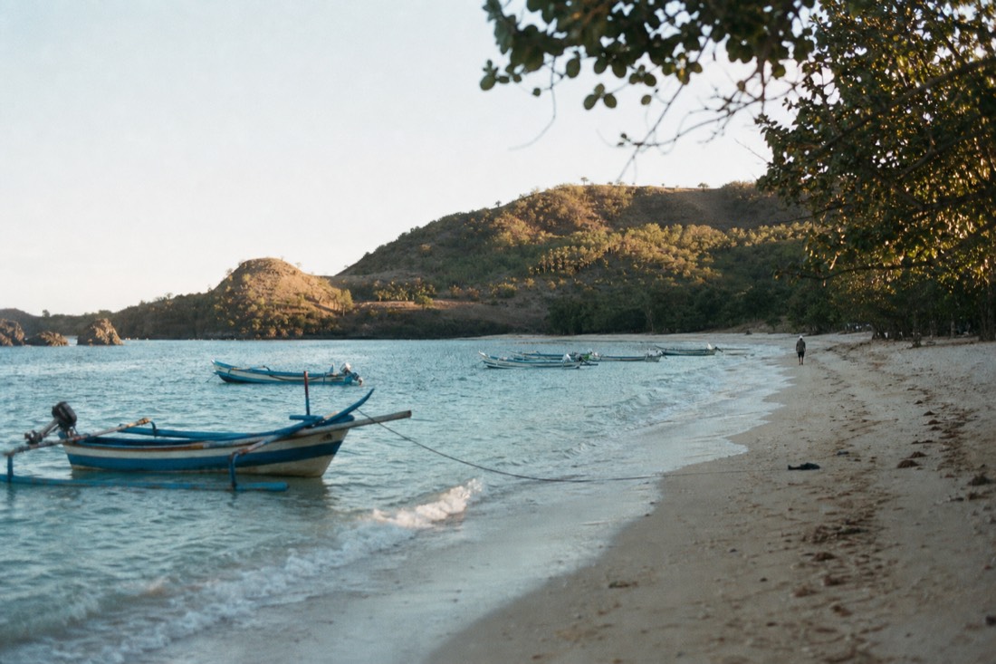 A quiet bay with outrigger boats in south Lombok